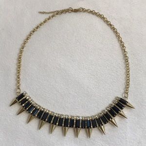 Gold spike statement necklace